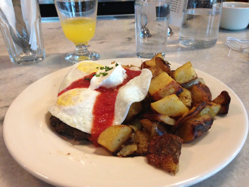 Black Beans Cakes & Eggs at West Egg Cafe, Photo Credit Ash Bruxvoort 